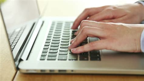 Person Typing On Laptop Keyboard Stock Footage Video 10661486