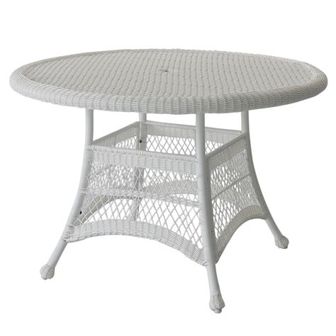 The dark brown or grey webbing of the wicker combines with the beauty of the smooth amber table top to seamlessly enhance the natural beauty of your back yard. White Wicker 44 Inch Round Dining Table
