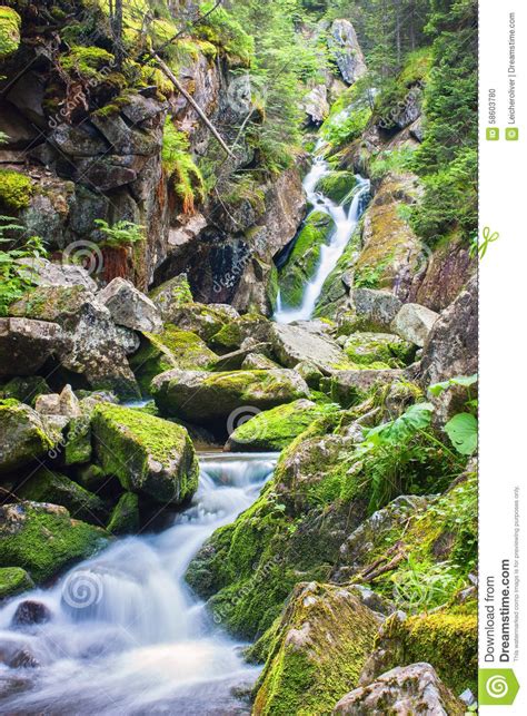 Beautiful Waterfall In The Middle Of Forest Stock Photo