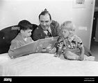 Pat O'Brien (center) reading a bedtime story with his children Sean O ...