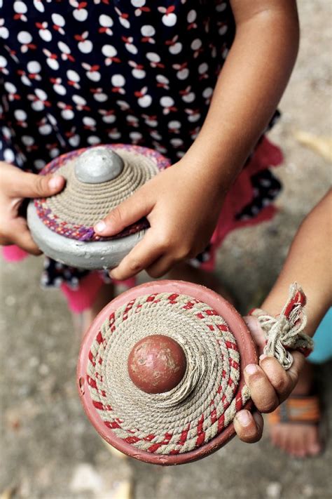 Malaysians have a strong sense of community reflected in traditional games as well as their community activities. Keeping The Traditional Game Of Gasing Alive | Going ...