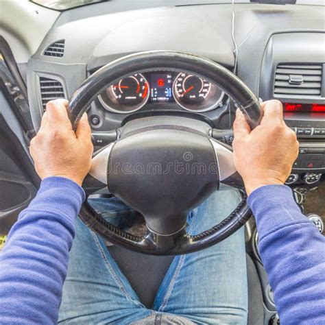 Man Driving A Car Men S Hands Hold The Steering Wheel Stock Image