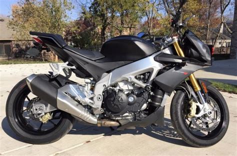 Available in various colors, v4 factory and v4 rr versions. 2014 Aprilia Tuono V4 R ABS - Matte Black (Lowered Reserve)