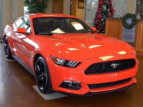 This 2015 ford mustang gt premium convertible was first delivered to ford of midland, michigan, and it was acquired by the seller in june of 2020 and now has just over 4k miles. 2015 Ford Mustang EcoBoost Premium in Competition Orange ...