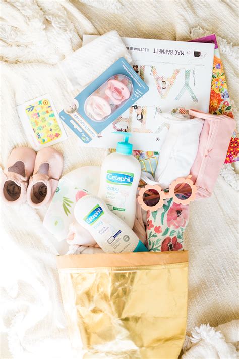 Onesies are always a great baby shower gift. How to Put Together the Cutest DIY Baby Shower Gift Basket ...