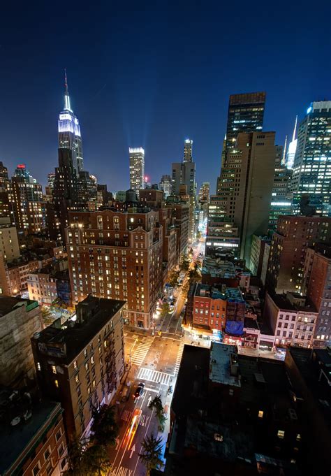 The Skyline Of Midtown Manhattan Seen At Night New York Rooftop