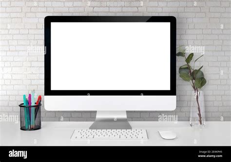 Mockup Display Screen Blank Computer On Desk With White Wall Office