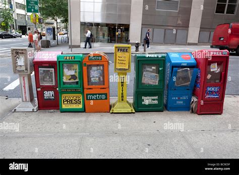 Free newspaper stands in NYC Stock Photo - Alamy
