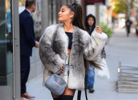 Ariana Grande Is The Queen Of Sass As She Poses In Faux Fur Coat