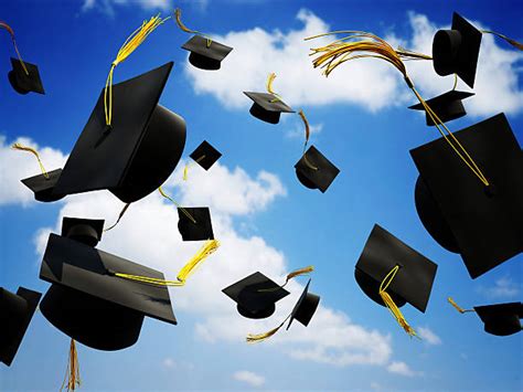 Graduation Cap In Air Stock Photos Pictures And Royalty Free Images Istock