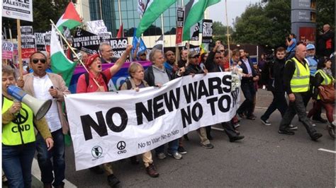 Protesters Stage Anti Nato March Bbc News