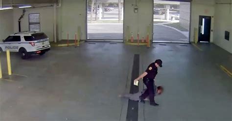 Police Officer Caught On Camera Dragging Handcuffed Woman Across Concrete Floor Mirror Online