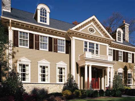 The larger colonial revival house often has an asymmetrical façade in order to accommodate a garage or porch. Rich and Warm | Paint Color Ideas for Colonial Revival ...
