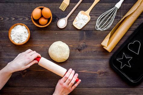 Roll Out The Dough Dough Ball Near Roller Pin And Other Cookware On