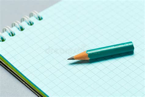 Short Worn Pencil With Notepad On Gray Desk Stock Image Image Of