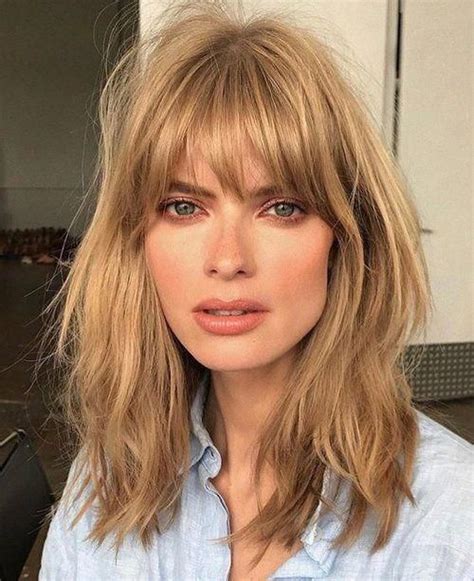 Curtain bangs help give curly hair shape and definition. Blonde woman with curtain fringe #shortstraighthair ...