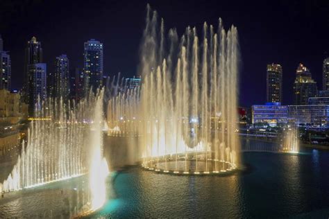 Dubai Burj Khalifa Fountain Show And Burj Lake Ride Getyourguide