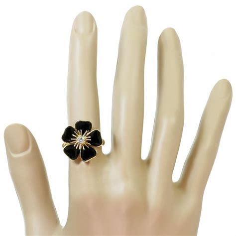 Van Cleef And Arpels Nerval Diamond Onyx Yellow Gold Flower Ring At 1stdibs