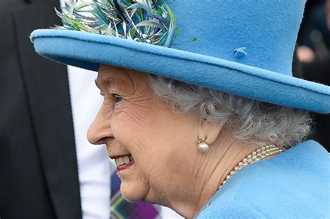 Queen Elizabeth II wears gloves during Investiture ceremony amid 