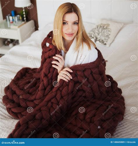 An Attractive Young Woman Is Wrapped In A Soft Fluffy Blanket Stock Image Image Of House