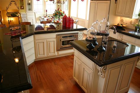 The subtle black from the hanging pendant lighting also matches the black barstools to really tie the kitchen together. Absolute Black Granite Price Per Square Foot & Decorating ...