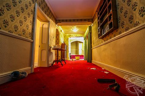 Inside An Eerie Abandoned Mansion Littered With Racist Scrawling And
