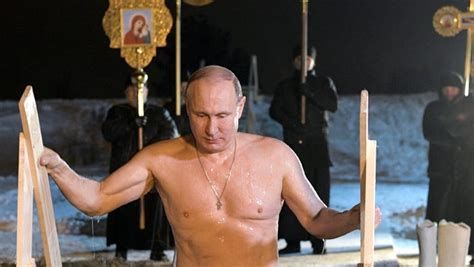 shirtless vladimir putin dunks himself in icy water to mark epiphany