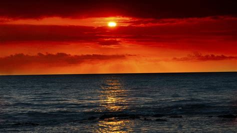 Sea Waves And Red Sunset Wallpapers 1024x576 186879