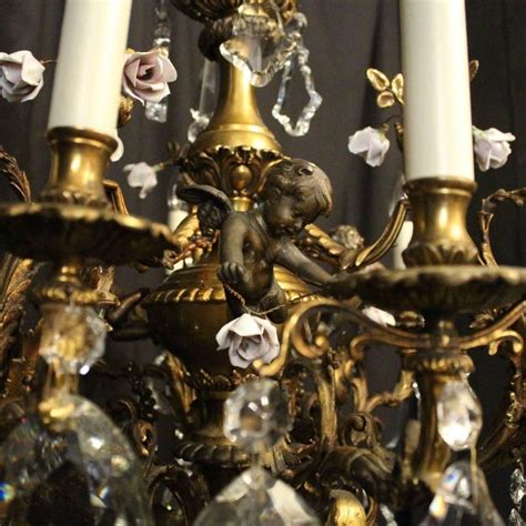 We carry a wide range of crystal styles including reproduction antique brass chandeliers, brass crystal chandeliers, metal chandeliers, and other materials such. French Gilded Cherub Bronze and Crystal Twelve-Light ...