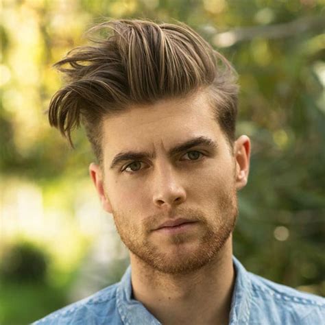 These modern haircuts are part of this new hair trend because the buzzed sides are fresh, clean, and mint to keep. Manly Haircuts and Beards | Men's Hairstyles + Haircuts 2017