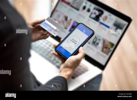 Using Laptop Online Shopping Payment Option Smartphone Digital Wallet