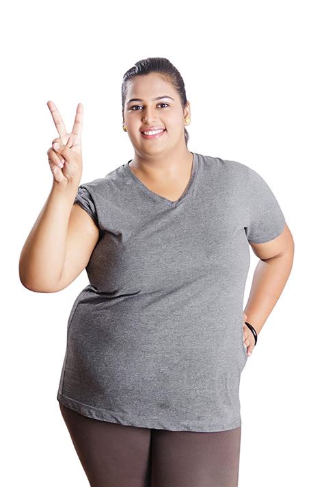 Young Indian Fat Woman Making Peace Sign With His Hand