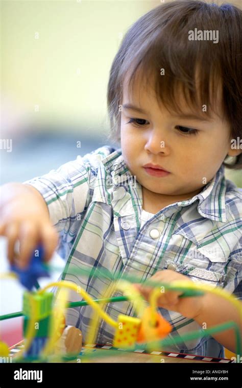 21 Month Old Boy Playing At The Daycare Montreal Quebec Canada Stock