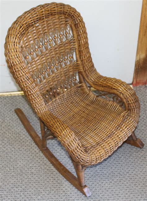 We have a huge front porch, indoor, and outdoor rocking chairs made out of wicker. Bargain John's Antiques | Antique Wicker Child's Rocking ...