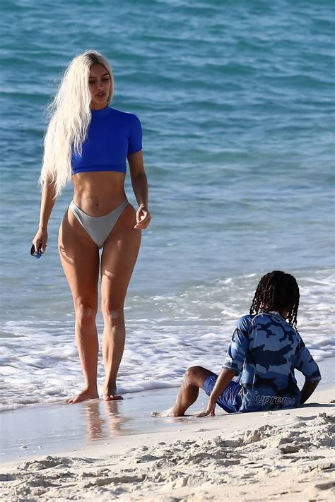 Kim Kardashian Shows Off Her Curvy Figure While Enjoying Another Beach