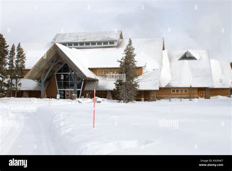 Snow Surrounds The Old Faithful Visitor Center In Winter At The