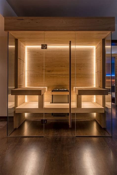 A Stylish Modern Wood Clad Sauna With Built In Lights And Benches Is