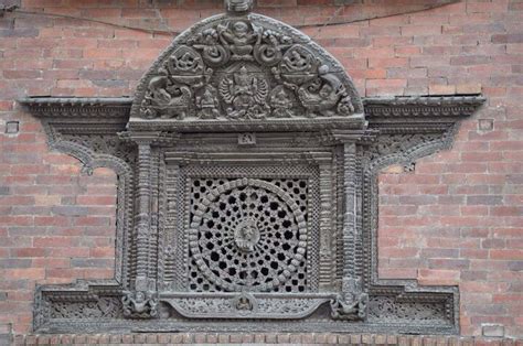 Wood Carving Window Of A Historical Building In Nepal Ancient