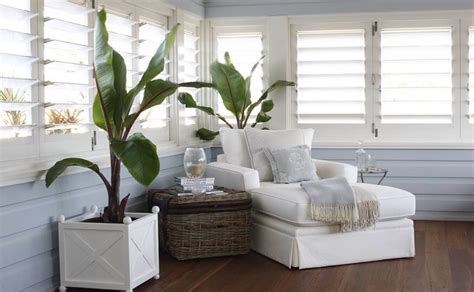 Timber plantation shutters escalate glamour of your residence. Coastal | Cottage living rooms, Sunroom decorating ...