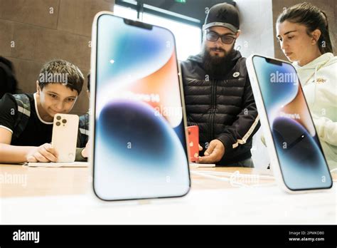 Paris, France - Sep 22, 2022: A young woman and her father and brother