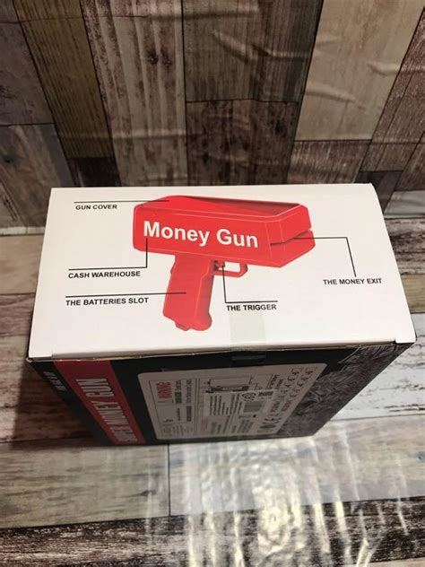Money Gun Пистолет который стреляет деньгами Super Money Gun 450