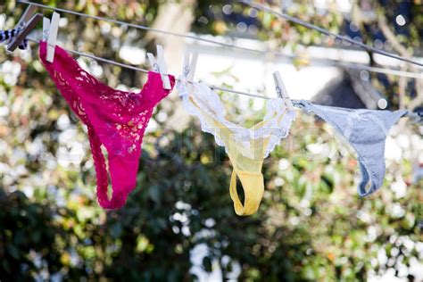 Underwear Hanging To Dry In A Clothesline Stock Image Colourbox