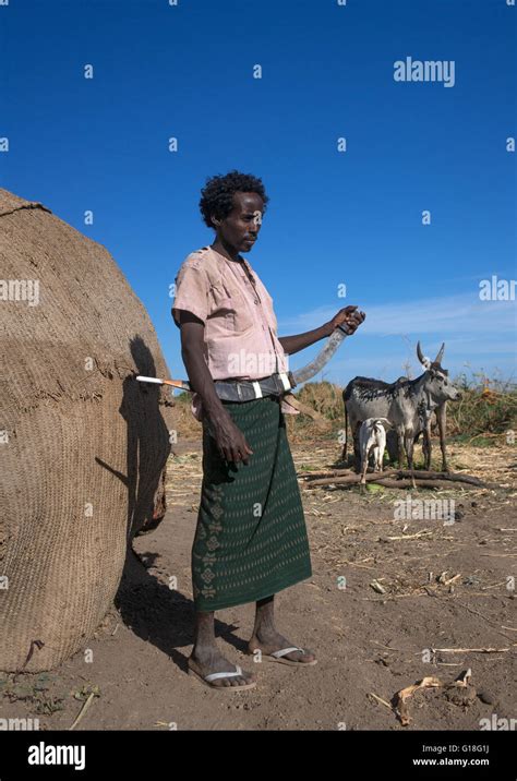 Afar Tribe Man With His Guile Knife In Front Of His Hut Afar Region