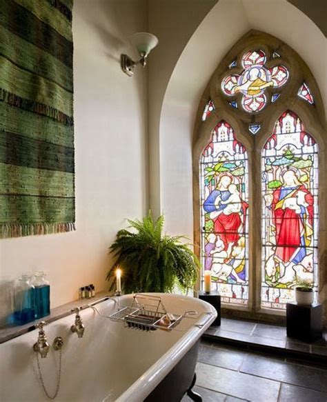 Using the same tile pattern on the bathtub surround and on the shower walls doesn't distract from the unique windows and gives the bathroom a spa feel. To da loos: Stained glass windows in the bathroom