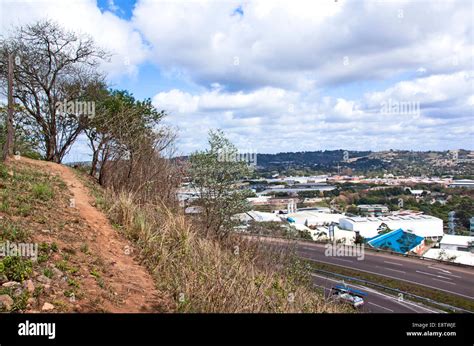 Footpath Beside Freeway Passing Built Up Industrial Area In Pinetown In