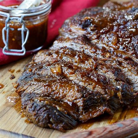 But when the weather is cold—as it currently is throughout much of the us—most of us don't venture outside to tend a smoker or grill. Oven-Barbecued Beef Brisket - Spicy Southern Kitchen ...