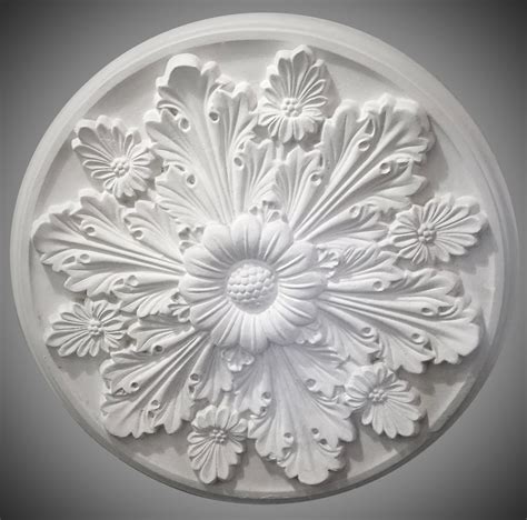 Ceiling roses were once used to conceal a ceiling's ventilation grills. Ceiling Rose 203 - Victorian - Ossett Mouldings Ltd