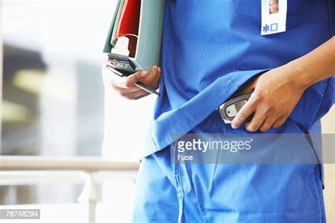 Doctor With Pager High Res Stock Photo Getty Images