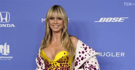 49 year old heidi klum bare breasted against the background of the pool greeted fans with