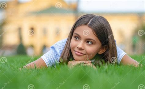 Cheerful Girl Relax At Summer Lawn Girl Relax At Summer Lawn With
